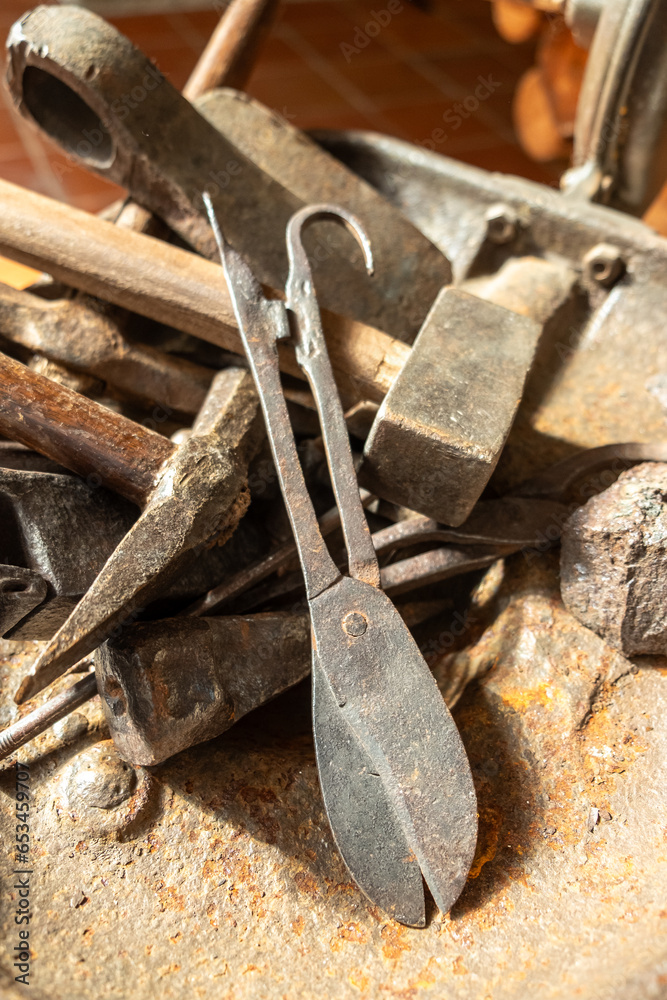 antique metal tools for traditional blacksmithing. old work tools antique metal tools for traditional blacksmithing. old work tools