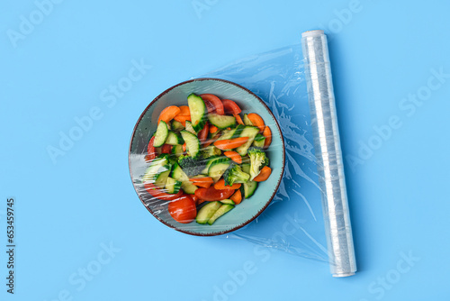 Bowl with salad wrapped wit...
