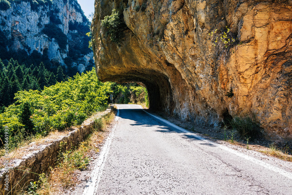 The gorgeous road under the rocks in the old Sparta-Kalamata highway in Peloponnese