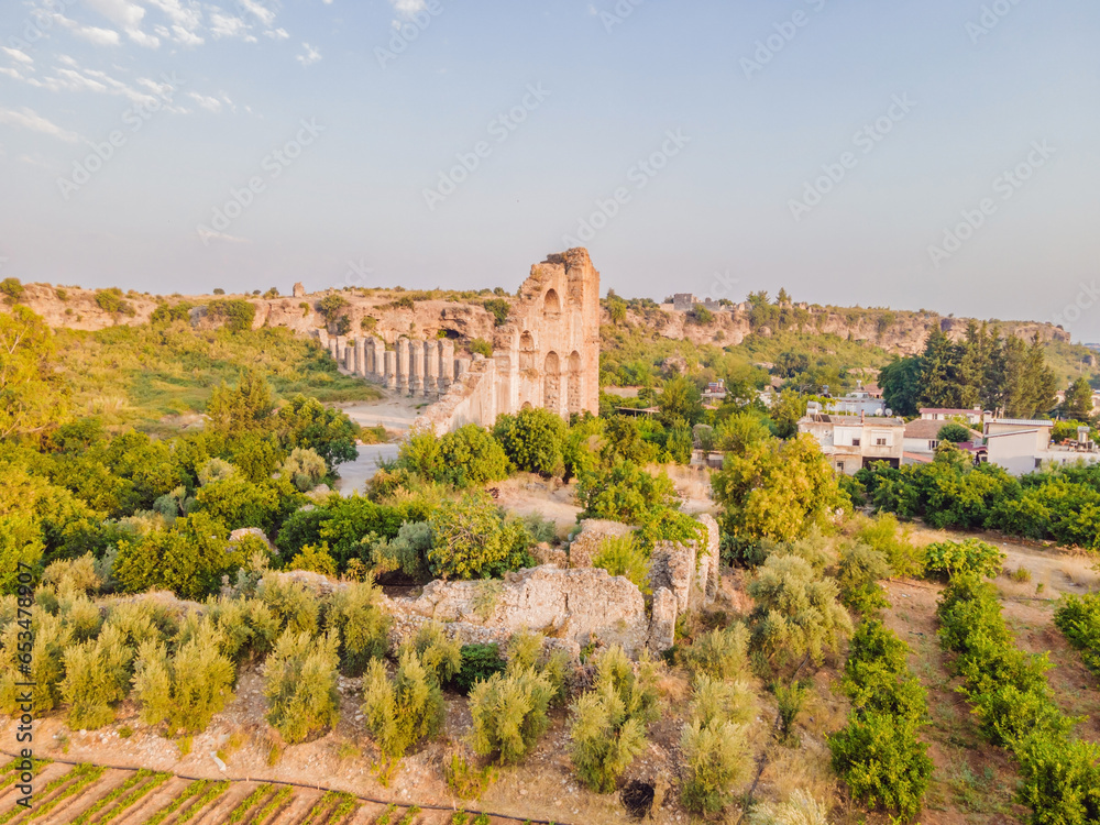 Naklejka premium Aspendos Ancient City. Aspendos acropolis city ruins, cisterns, aqueducts and old temple. Aspendos Antalya Turkey. turkiye turkiye, GO Everywhere