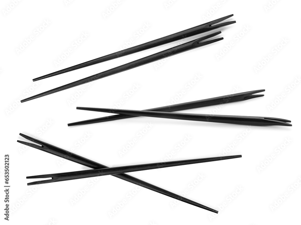 Collage with black chopsticks isolated on white Collage with black chopsticks isolated on white