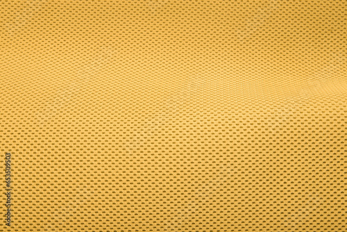 Rough yellow fabric texture, cotton knitted fabric, modern waterproof flexible temperature control materials, multifunctional smart textile close-up, selective focus, does not tear