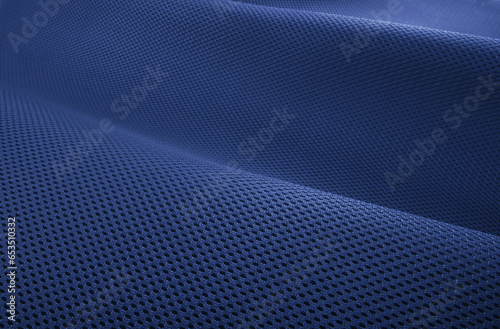 Rough navy blue fabric texture, cotton knitted fabric, modern waterproof flexible temperature control materials, multifunctional smart textile close-up, selective focus, does not tear