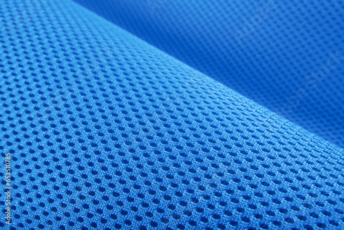 Rough blue fabric texture, cotton knitted fabric, modern waterproof flexible temperature control materials, multifunctional smart textile close-up, selective focus, does not tear