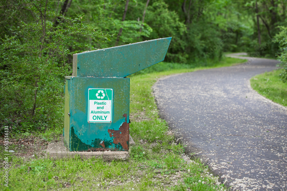 Recycling bin along a nature trail for plastic and aluminum only Recycling bin along a nature trail for plastic and aluminum only