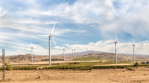 The Golan  Heights Wind Farm is Israeli wind farm with wind turbines which generate clean energy is located 1050 m above sea level on Mount Bnei Rasan 5 km south of Quneitra in the Golan Heights. photo