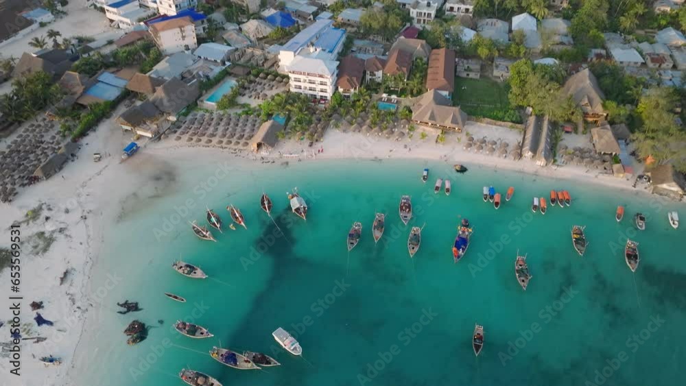 Aerial view of wooden fisherman boats and sandy beach at Kendwa village, Zanzibar,Tanzania. Aerial view of wooden fisherman boats and sandy beach at Kendwa village, Zanzibar,Tanzania.