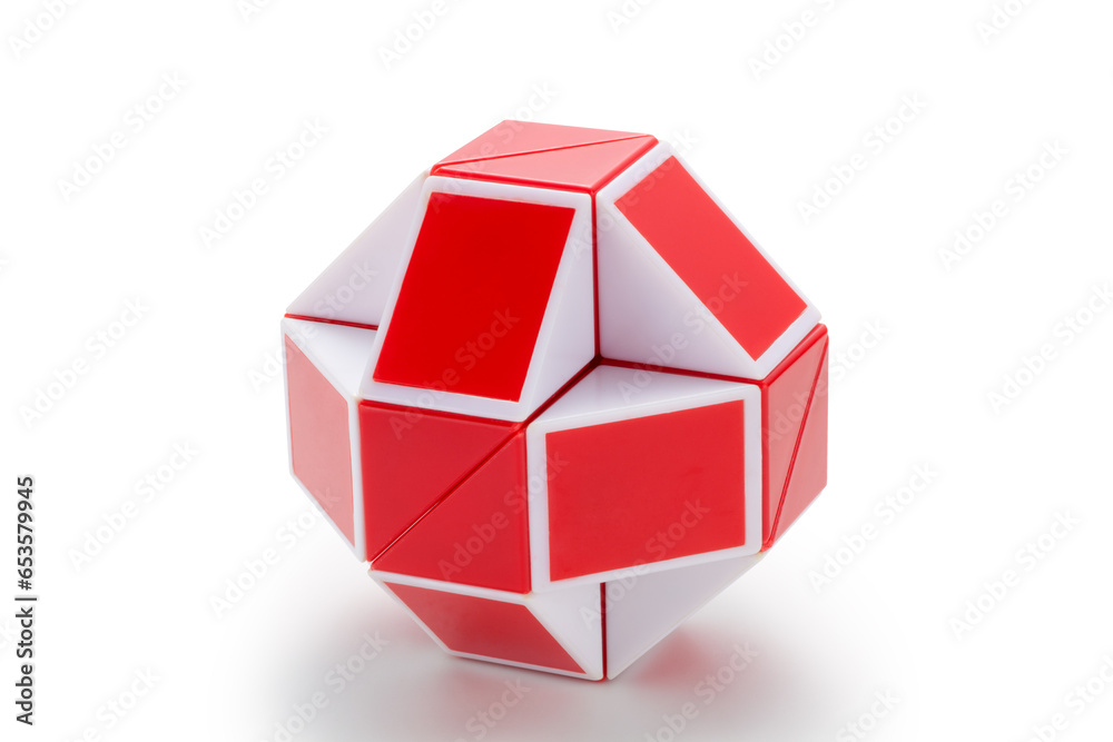 Shape of ball by red and white magic snake ruler twisty puzzle isolated on white background Shape of ball by red and white magic snake ruler twisty puzzle isolated on white background