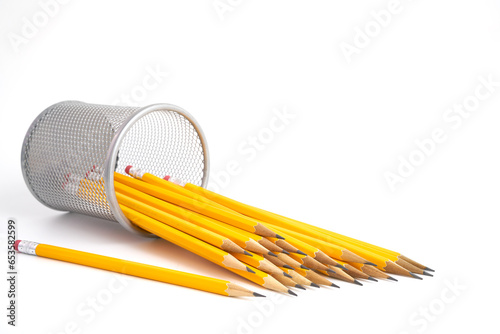 Pen holder full of pencils on isolated background