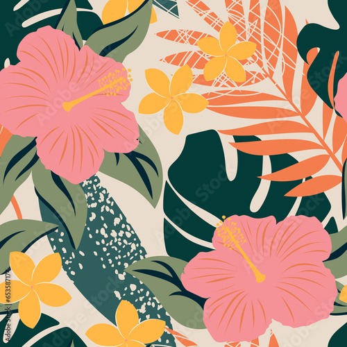 Abstract modern hibiscus flowers, plumeria and tropical leaves form a seamless floral pattern for fabric. 