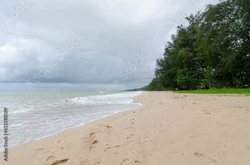 tropical white sand smooth beach with calm sea ocean and sunrise clear blue sky background.tropical white sand beach beach with blue sky and white cloud background