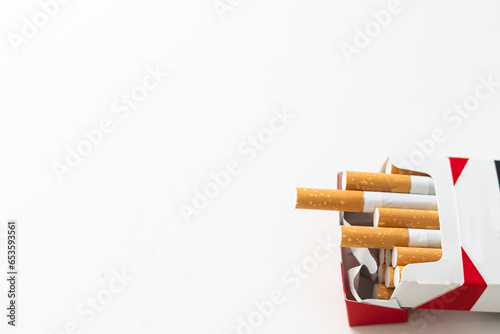 Close-up of tobacco cigarettes on white background,Unhealthy concept photo