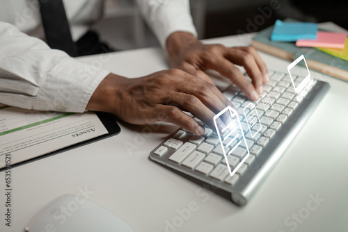 Businessman is transferring digital data through computer systems and servers, uploading data online, storing data in databases. Concepts for transferring digital document data.
