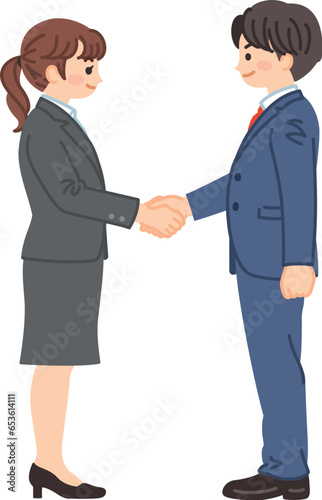 握手をするスーツ姿の若い男女　ビジネスシーン