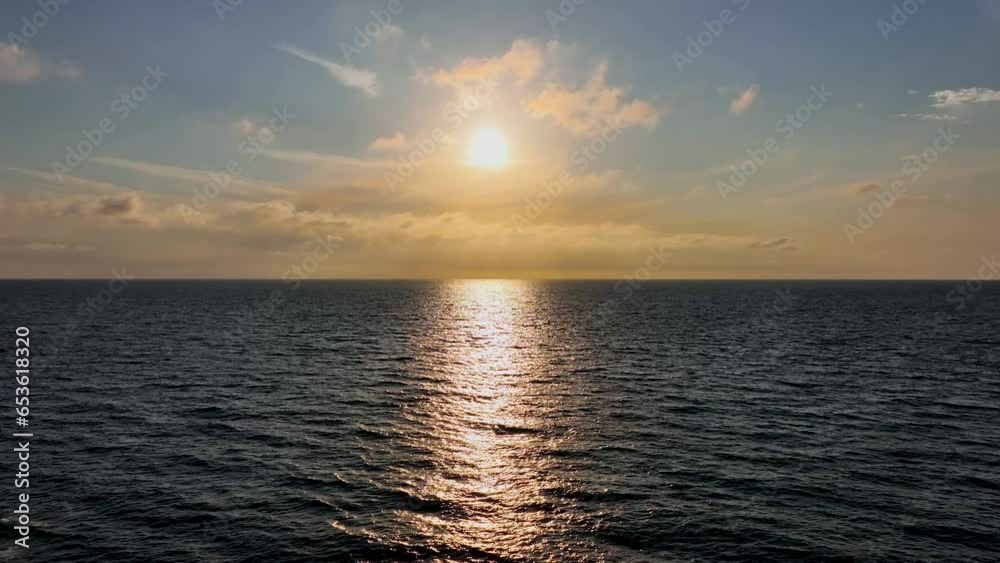 Bright sunset with yellow sun under the sea surface in 4K Bright sunset with yellow sun under the sea surface in 4K