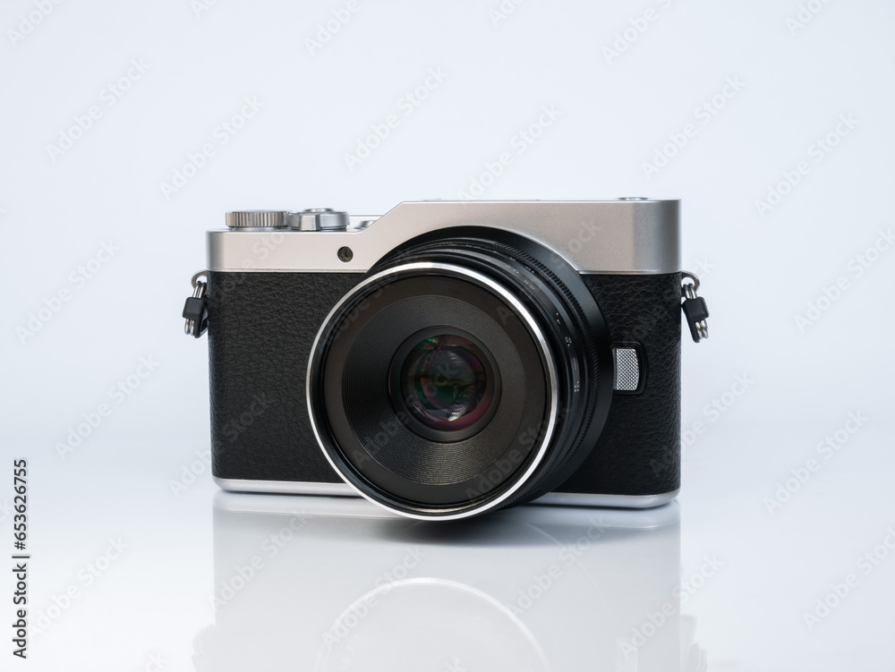 Camera in retro style on a white background with reflection Camera in retro style on a white background with reflection