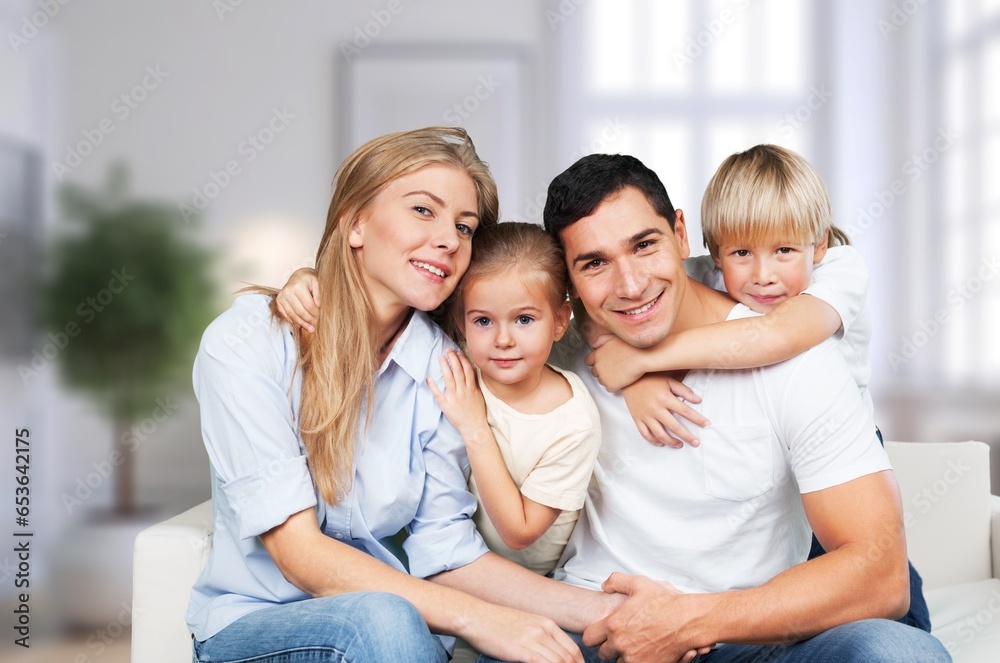 Joyful happy young family with kids sitting at home, AI generated image Joyful happy young family with kids sitting at home, AI generated image