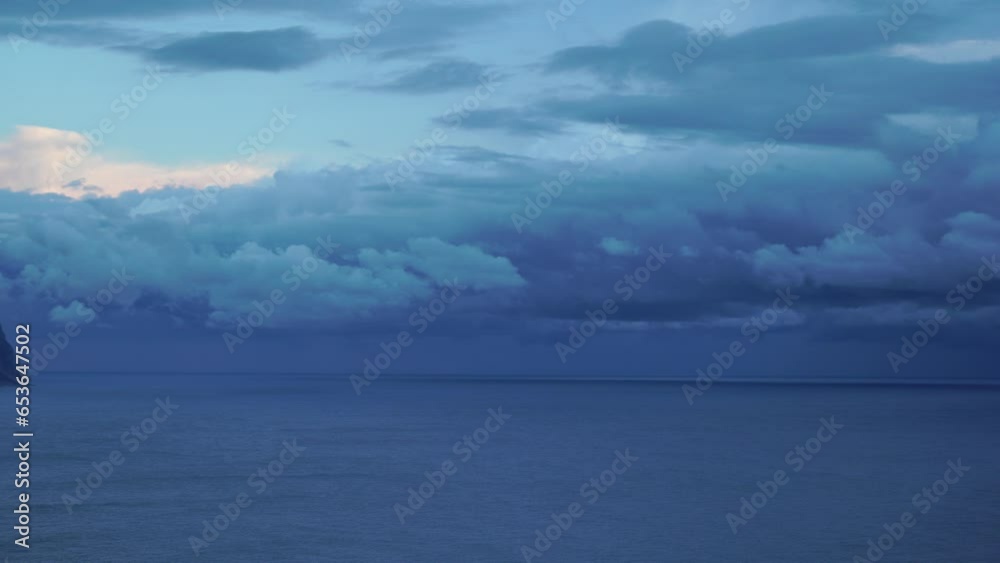 Aerial view. Dramatic sunset over foggy and fluffy clouds. Blue sky sun and sea fog. Abstract aerial nature summer ocean sunset sea and sky background. Horizon. Vacation, travel and holiday concept Aerial view. Dramatic sunset over foggy and fluffy clouds. Blue sky sun and sea fog. Abstract aerial nature summer ocean sunset sea and sky background. Horizon. Vacation, travel and holiday concept