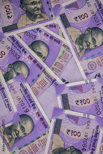 
Top view shot of hundred rupee notes - inflation concept.