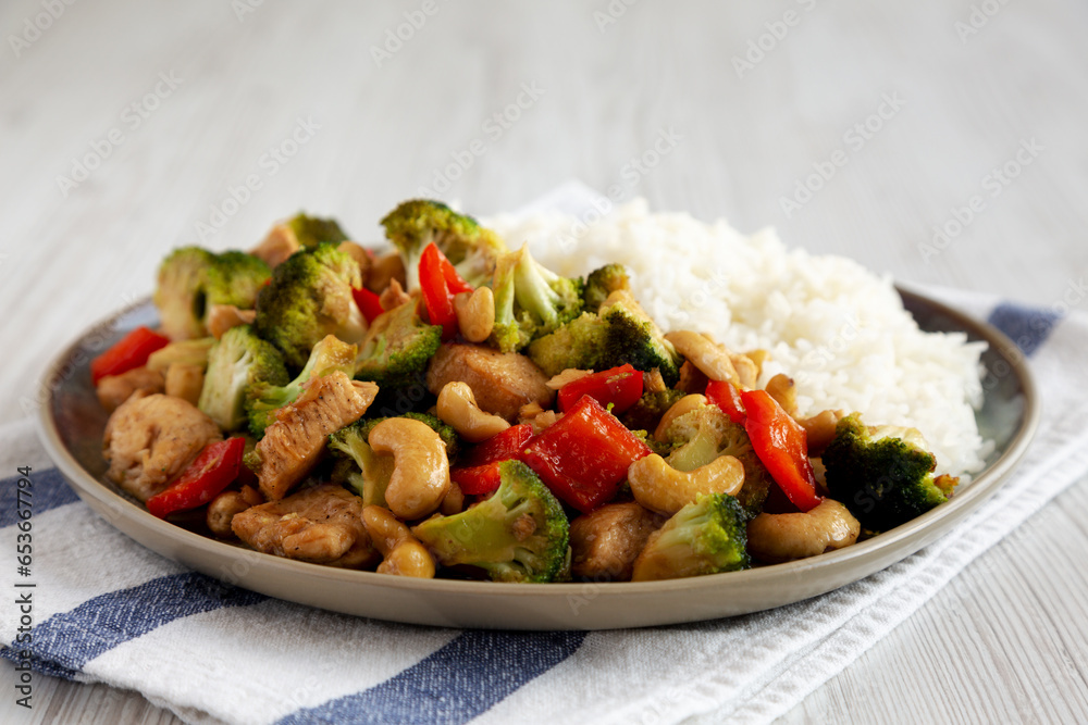 Homemade Cashew Chicken Stir-Fry on a Plate, side view.