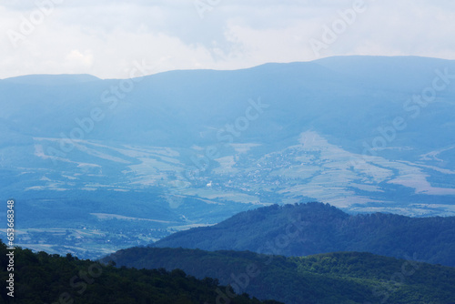 mountainous rolling landscape in summer. nature background in morning light