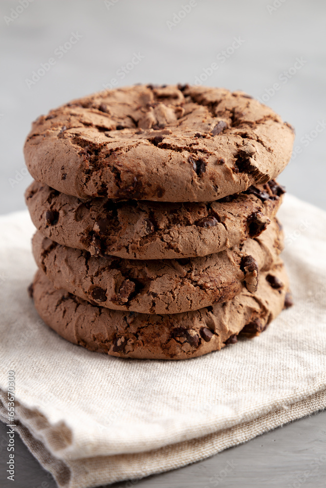 Fototapeta premium Stack of Fresh Dark Chocolate Chip Cookies, side view. Close-up.