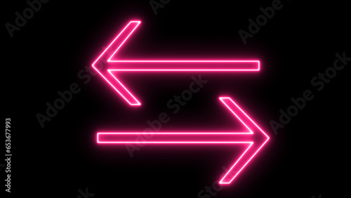 Two left and right pink vintage bright and colorful illuminated display arrows against black background.