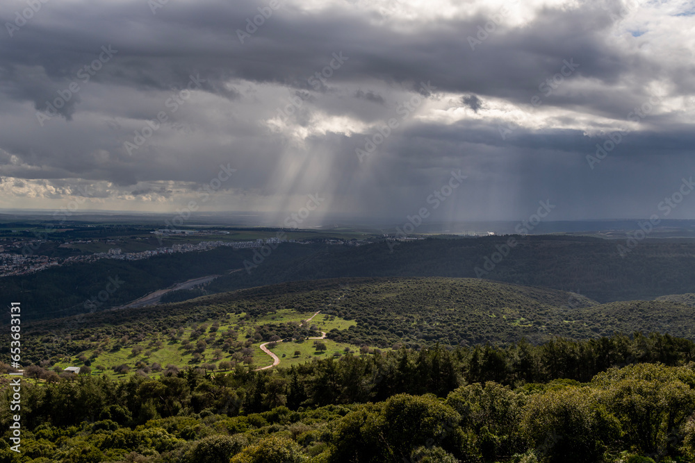 View of Yoqneam, Israel and beyond from a viewpoint on Mount Carmel on a rainy day in the Winter
