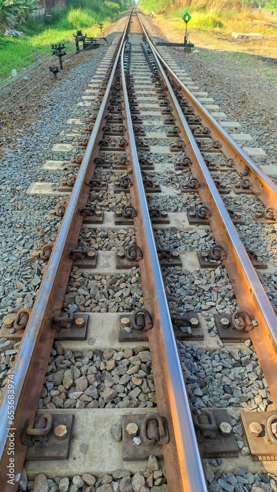 Transportation background of two track old rusty railway in urban area Transportation background of two track old rusty railway in urban area