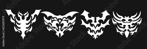 Set Cyber Sigilism Tattoo Shapes, abstract Neo-Tribal elements with sharp with spikes. Gothic abstract patterns for streetwear, typography, t-shirt. Acid y2k Neo tribal shapes.