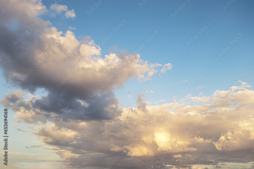 abstract background of cloudy sunset sky golden hour