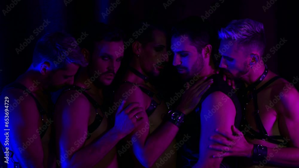 Group of homosexual men in an intimate environment in a loving attitude towards each other.
