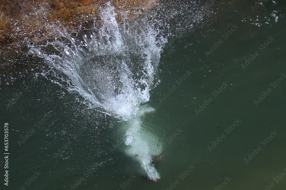 water flowing into the water water flowing into the water