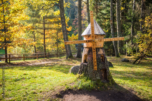 Miniature wooden mill to decorate park in Ligatne, Latvia. Decorative mill in the park photo