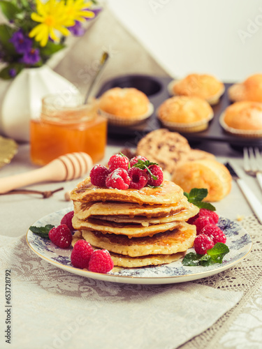 Plate with tasty pancakes with berries