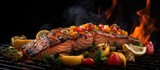 Grilled salmon with vegetable skewers on a flaming grill