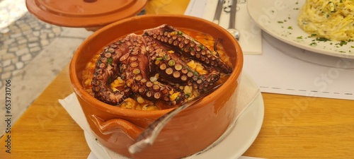 A plate of rice with octopus, a delightful seafood dish.