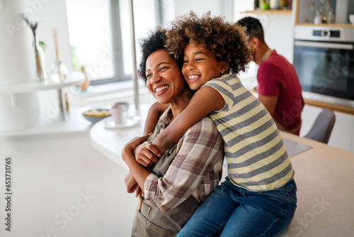 Slika na platnu Portrait of african mother hugging with her daughter, enjoying moment of love, h