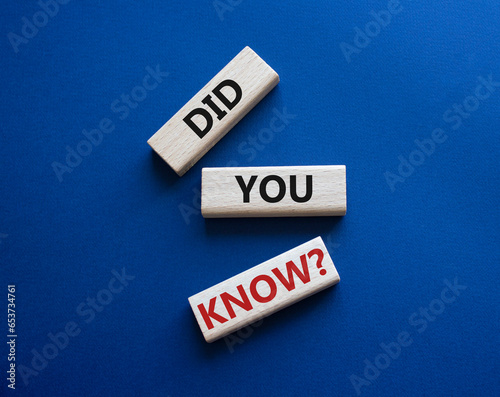Did you know symbol. Wooden blocks with words Did you know. Beautiful deep blue background. Business and Did you know concept. Copy space.
