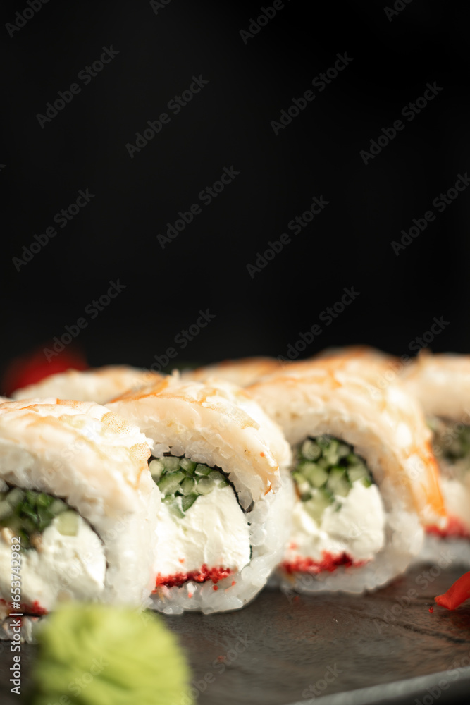 Close-up of king prawn sushi on a black background. Japanese restaurant menu sushi Close-up of king prawn sushi on a black background. Japanese restaurant menu sushi