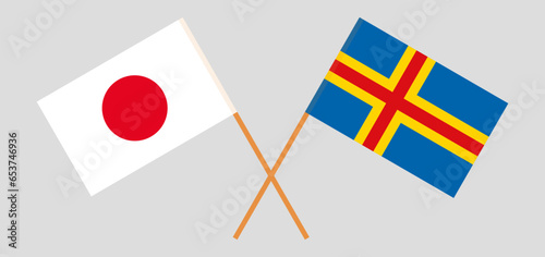 Crossed flags of Japan and Region of Aland. Official colors. Correct proportion