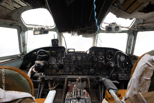 Cockpit interior of old airplane with all the switches