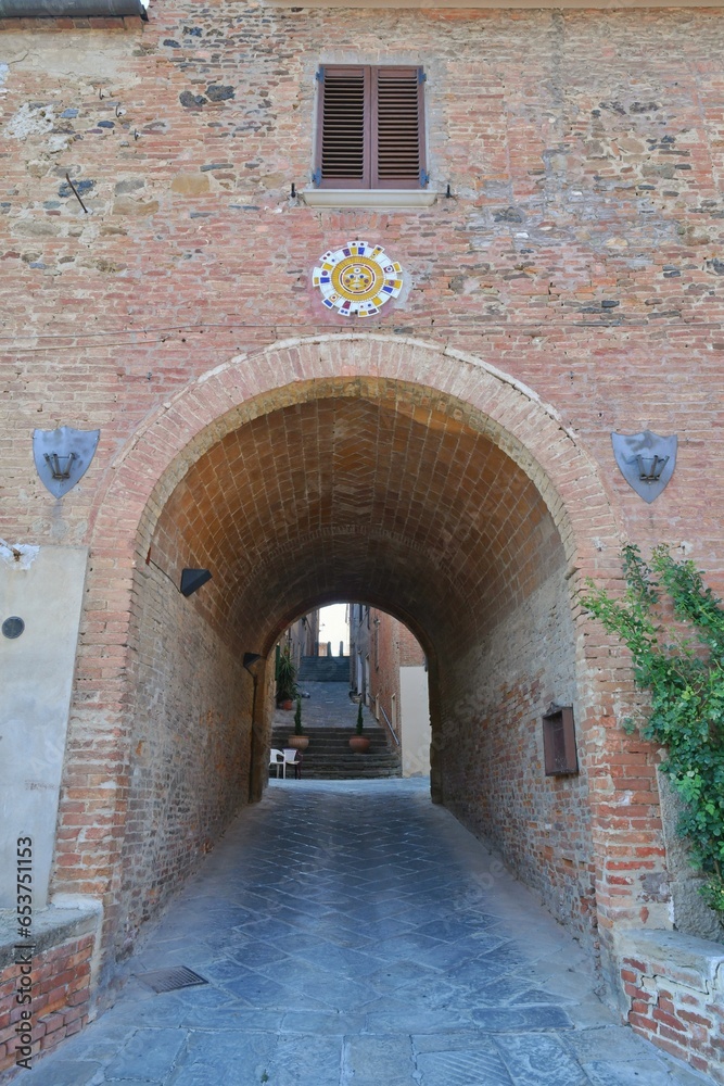 An ancient entrance arch in Torrita di Siena, a medieval town in Tuscany.