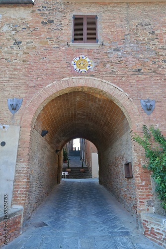 An ancient entrance arch in Torrita di Siena, a medieval town in Tuscany.