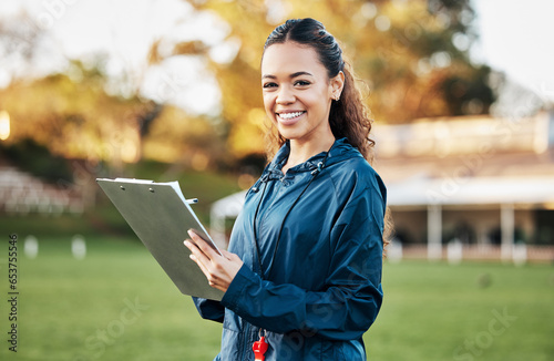 Fototapeta Naklejka Na Ścianę i Meble -  Coach, sports and portrait of woman with clipboard on field for training, planning and game strategy. Happy, writing and personal trainer outdoors for exercise, workout schedule and fitness routine