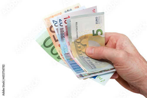 Obraz na płótnie A hand holding, giving or paying in European Euros in 5, 10, 20, 50 and 100 banknotes, paper currency money, isolated against a transparent background. w salonie