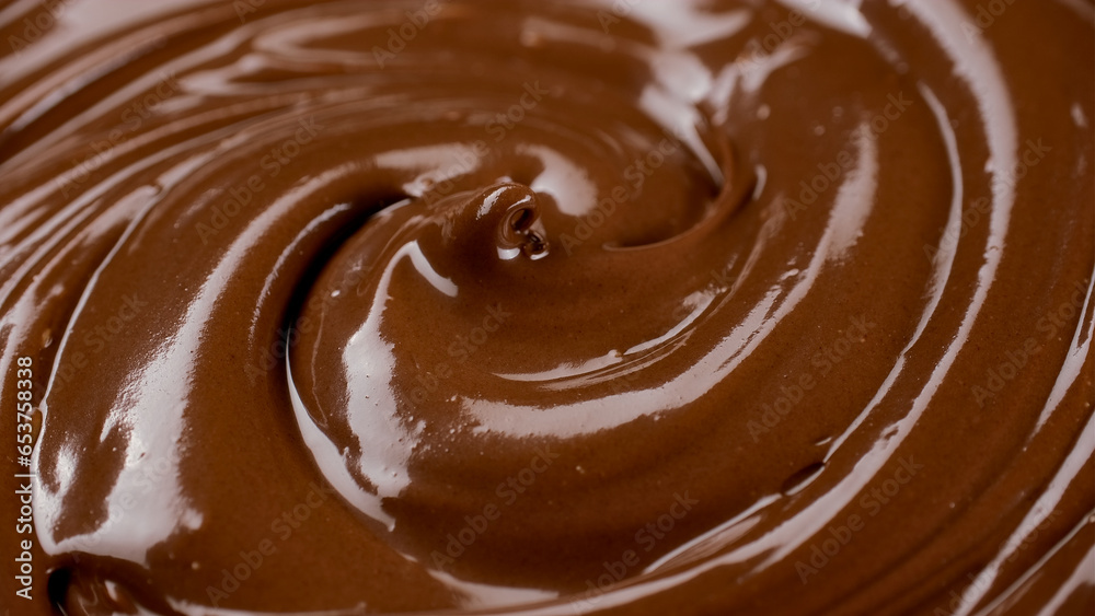 Melted dark chocolate, close up. Confectionery concept Melted dark chocolate, close up. Confectionery concept