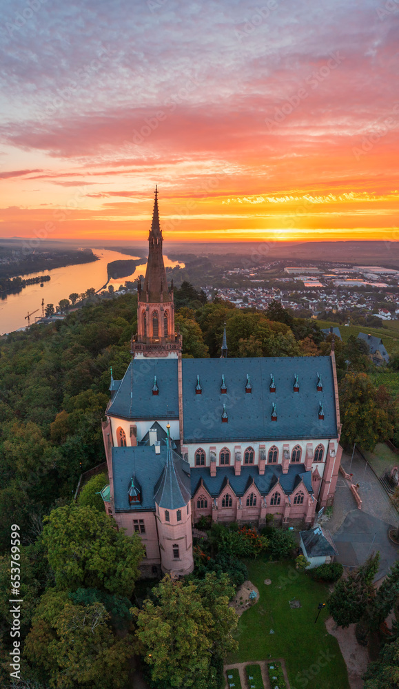 Fototapeta premium Bird's-eye view of the Rochus Chapel near Bingen/Germany in autumn at sunrise