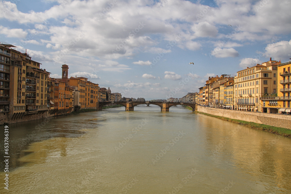 View of the Arno River with Ponte Santa Trinita, Beautiful view of Arno Frenze, Old Yellow Buildings and Ponte Santa Trinita