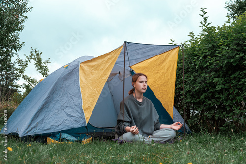 meditation Woman meditates nature outdoor. ground level,relaxed woman meditates breathes fragrant incense during a yoga class garden,healthy living,slowing-down, deceleration, peace,wellness